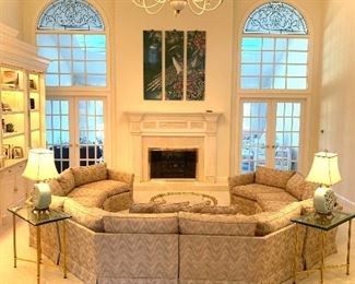 $3500. Custom, 6 piece circular sectional sofa, by Jack Brandt. Sofa is beige with accents of blue, mauve and light pink. Approximate measurements: left arm 70 inches, center arm 140 inches and right arm 70 inches. Excellent condition.