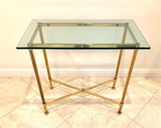 $250 for the PAIR of beveled, glass top side tables. Base is made from lighweight brass. Glass tops are heavy! Tables are 30Lx16Wx27H. Good condition. There is one teeny chip in the glass on each of the tables.