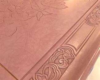 Hand carved detail on the Chinoiserie table.