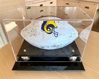 $300. Kurt Warner/Rams signed football. Display case included.