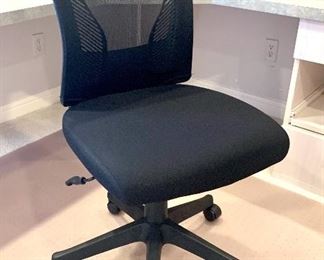 $38. Newer office chair, black with mesh back. Adjustable height.