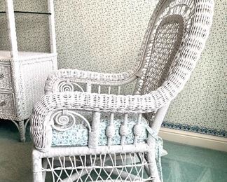 $150. White wicker rocker, cushion included. Comfy and Excellent condition! 27x22x44.