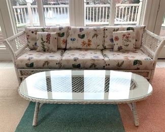 $300 for BOTH the white wicker sofa and coffee table. Both in GREAT condition!