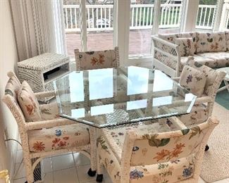 $250 for the SET; glass top table with white wicker base and 4 white wicker chairs on casters. All in great condition!