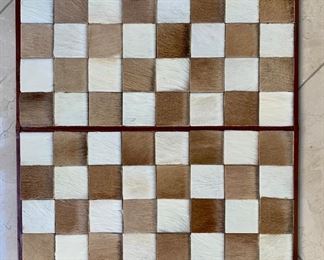 $40. Animal hide game board.