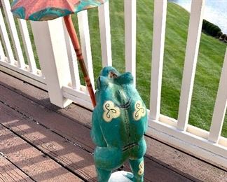 Back view of the handpainted, wooden frog. $150