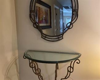 LOT 6679  Metal mirror with table that attaches to wall $600