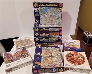 Jigsaw Puzzles, 10 Boxes of 1,000 Pieces.