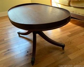 Rolling Rimmed Mahogany Coffee Table