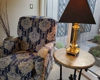 Arm chair , lamp wood top table. Metal base 