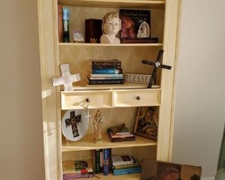 Cream book shelf, religious books,  religious decor