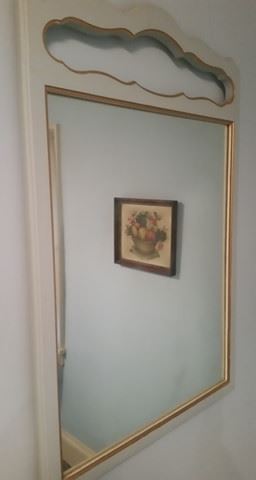 Mirror with gold accents