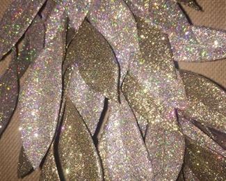 With tags, beautiful year-round gold and silver glitter holiday wreath.
About 22" diameter from widest leaf.