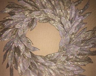 With tags, beautiful year-round gold and silver glitter holiday wreath.
About 22" diameter from widest leaf.