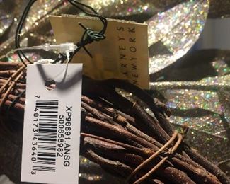 With tags, beautiful year-round gold and silver glitter holiday wreath.
About 22" diameter from widest leaf.