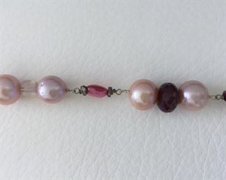 Pearl and bead necklace with:
Freshwater Pearls
Glass-filled Rubies
Rose Quartz
Tourmaline
Garnet Almondine
Morganite
Wear long (16.5" length) or double it