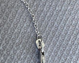 .55CTW DIAMOND AND 18KT WHITE GOLD CLUSTER FLEURETTE PENDANT NECKLACE
Metal Type: 18KT White Gold
Necklace Hallmark: 18KT/750 White Gold. Location: Clasp
Metal Finish: High Polish
Gemstone: Diamond
Carat Total Weight: .55
Stone Count: 9 Diamonds
Stone Shape: Round Brilliant
Color Grade: F-G
Clarity Grade: VS
Cut: Excellent
Condition: Excellent
18KT White Gold Chain Length: Approx.15"