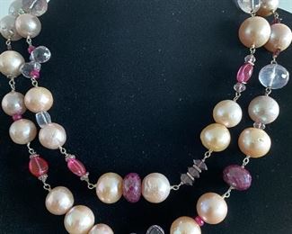 Pearl and bead necklace with:
Freshwater Pearls
Glass-filled Rubies
Rose Quartz
Tourmaline
Garnet Almondine
Morganite
Wear long (16.5" length) or double it. Stone Identification Report by Appraiser included in this sale.