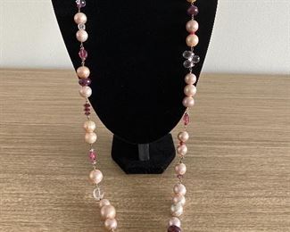 Pearl and bead necklace with: 
Freshwater Pearls
Glass-filled Rubies
Rose Quartz
Tourmaline
Garnet Almondine
Morganite
Wear long (16.5" length) or double it. Stone Identification Report by Appraiser included in this sale.