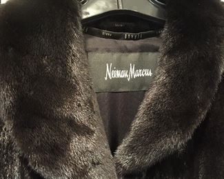 Neiman Marcus FERAUD Paris 
Full-length Long Ladies Black Mink Fur Coat 
Made in Canada 
Estimated retail: $29,000

Extremely high quality. Excellent condition. Excellent, clean lining. Dual slit pockets at sides. Concealed 3 hook-and-eye closures in front. Front-top button for extra warmth. Worn twice. Magnificent sheen on this fur. 

This coat has NOT been altered in size from its original purchase. 
4 monogrammed initials in inside lining. 
Comes with Neiman Marcus dust bag. 

APPROXIMATE MEASUREMENTS:
Length from top of shoulder to bottom of coat: 52"
Shoulders: 18"
Sleeve: 26"
Waist: 40"
