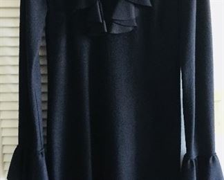 GUCCI BLACK WOOL RUFFLE-TRIMMED DRESS
SIZE SMALL
Bust: 34" Waist: 30" Length: 37"
FABRIC: 100% WOOL
CONDITION: VERY GOOD. LIGHT OVERALL WEAR