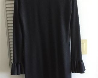 GUCCI BLACK WOOL RUFFLE-TRIMMED DRESS
SIZE SMALL
Bust: 34" Waist: 30" Length: 37"
FABRIC: 100% WOOL
CONDITION: VERY GOOD. LIGHT OVERALL WEAR.