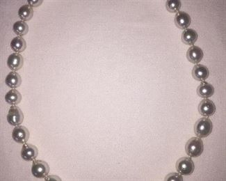 
BAROQUE PEARL NECKLACE
Beautiful Baroque White Pearls with fabulous luster. 
19" from end to end, including clasp. 

