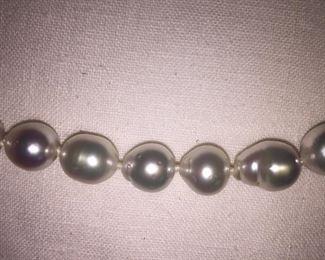 
BAROQUE PEARL NECKLACE
Beautiful Baroque White Pearls with fabulous luster. 
19" from end to end, including clasp. 