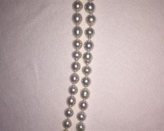 
BAROQUE PEARL NECKLACE
Beautiful Baroque White Pearls with fabulous luster. 
19" from end to end, including clasp. 

