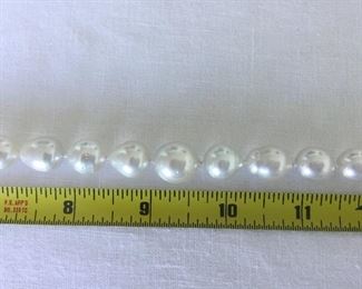 BAROQUE PEARL NECKLACE
Beautiful Baroque White Pearls with fabulous luster. 
19" from end to end, including clasp. 
