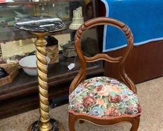 upholstered chair and nice statuary stand or plant pedestal
