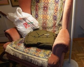 Wingback chair and old uniform