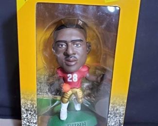 NFL HEADLINERS XL. Warrick Dunn. with Certificate of Authenticity
