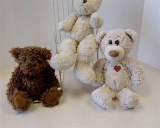 3 stuffed bears and rocking chair