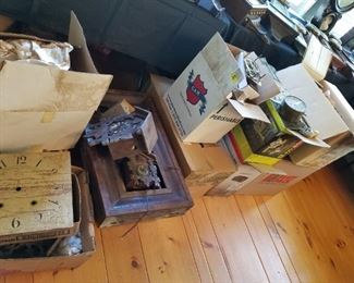 boxes of clock parts and bodies