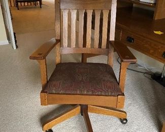 BUY IT NOW! $400 authentic Stickley spindle back desk chair, adjustable, swivel, tilts with striking arts & crafts upholstered seat.