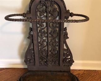 antique cast iron umbrella or cane stand