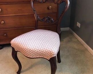 Antique curvy side chair with rosebud upholstered seat