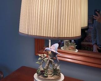 vintage porcelain bird lamp with punched metal lighted base