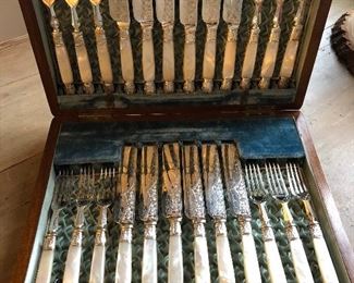 English 19th c. fruit set with 12 forks & knives, mother of pearl handles w/ sterling collars & tips in wood presentation case