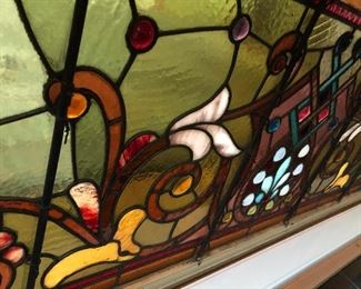 Reverse and close up of large stained glass