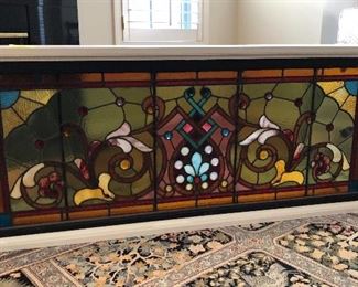 Stunning large stained glass in original window frame encased in newer boxed lighted frame. Ask for more pics to show more details and one flaw. 57.5” x 24.5” x 7.5”. 