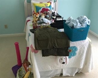 Girls twin bed with toys stuffed animals