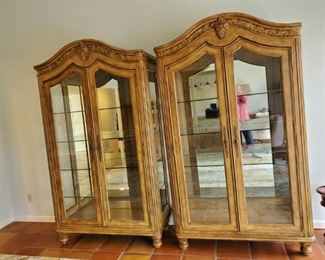 Lighted pair of display, china cabinet with glass shelves and mirrored back