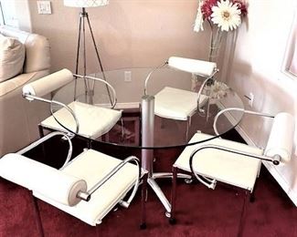 Chrome & Glass Dining set w/floating backrest leather chairs