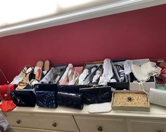 Clutch purses and many never worn shoes in boxes