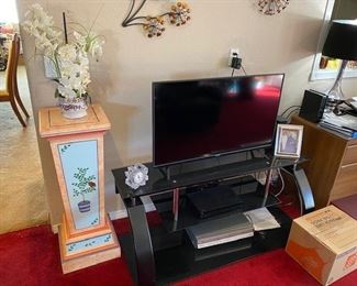 42" HDTV and Black Glass TV Stand
