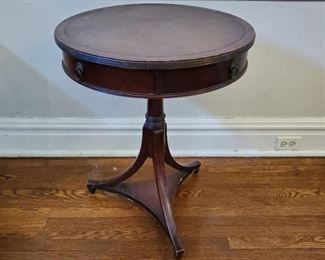 Round leather topped table - 27" tall x 22" diameter