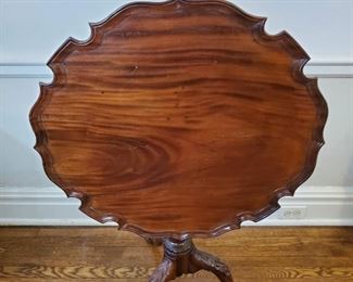 Tilt-top table with scalloped edge - 42" tall (when upright) x 27" wide x 23" deep with a 27" diameter to the table top