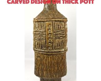 Lot 21 Large Studio Pottery Vase. Carved design on thick pott